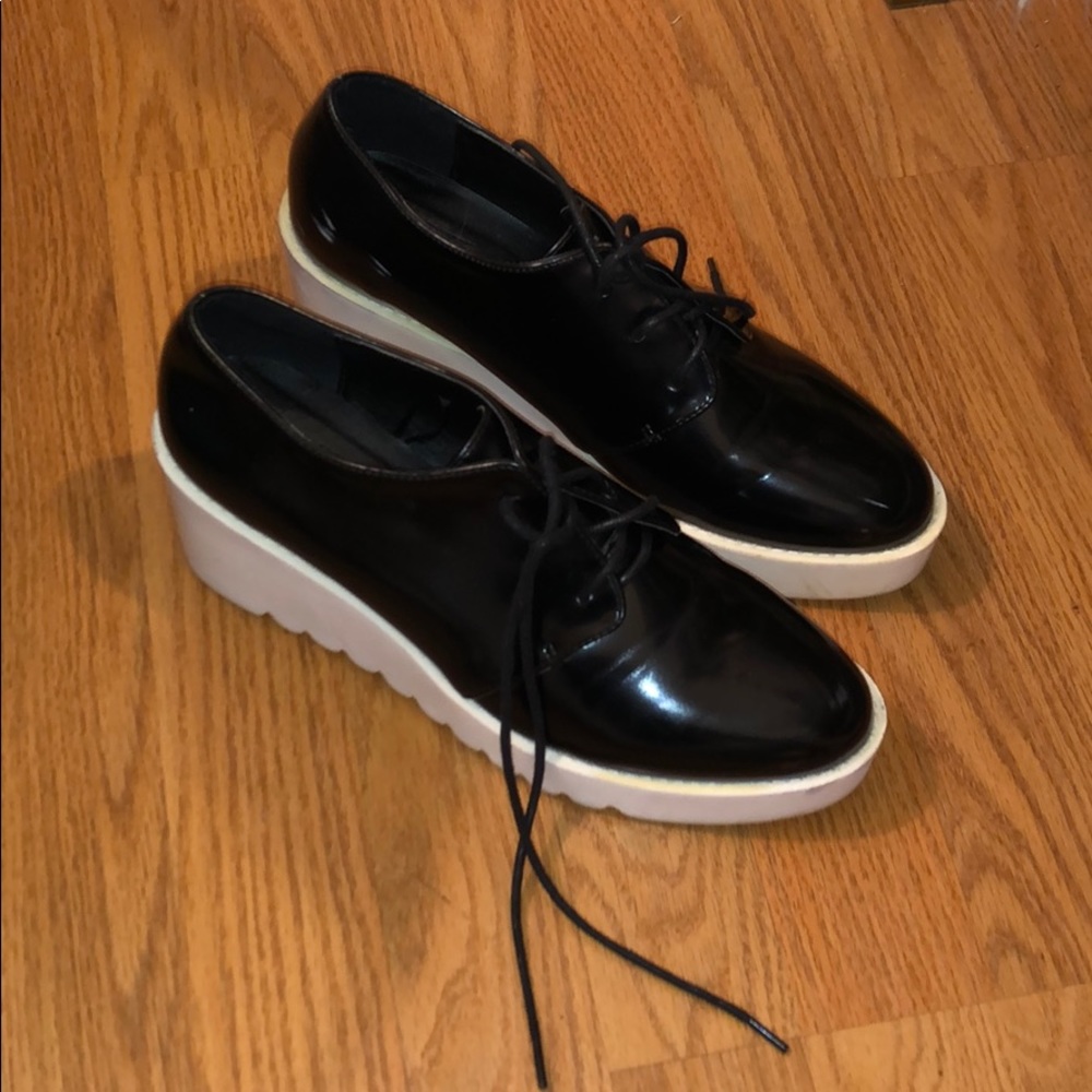 Retro black and white platform loafers
